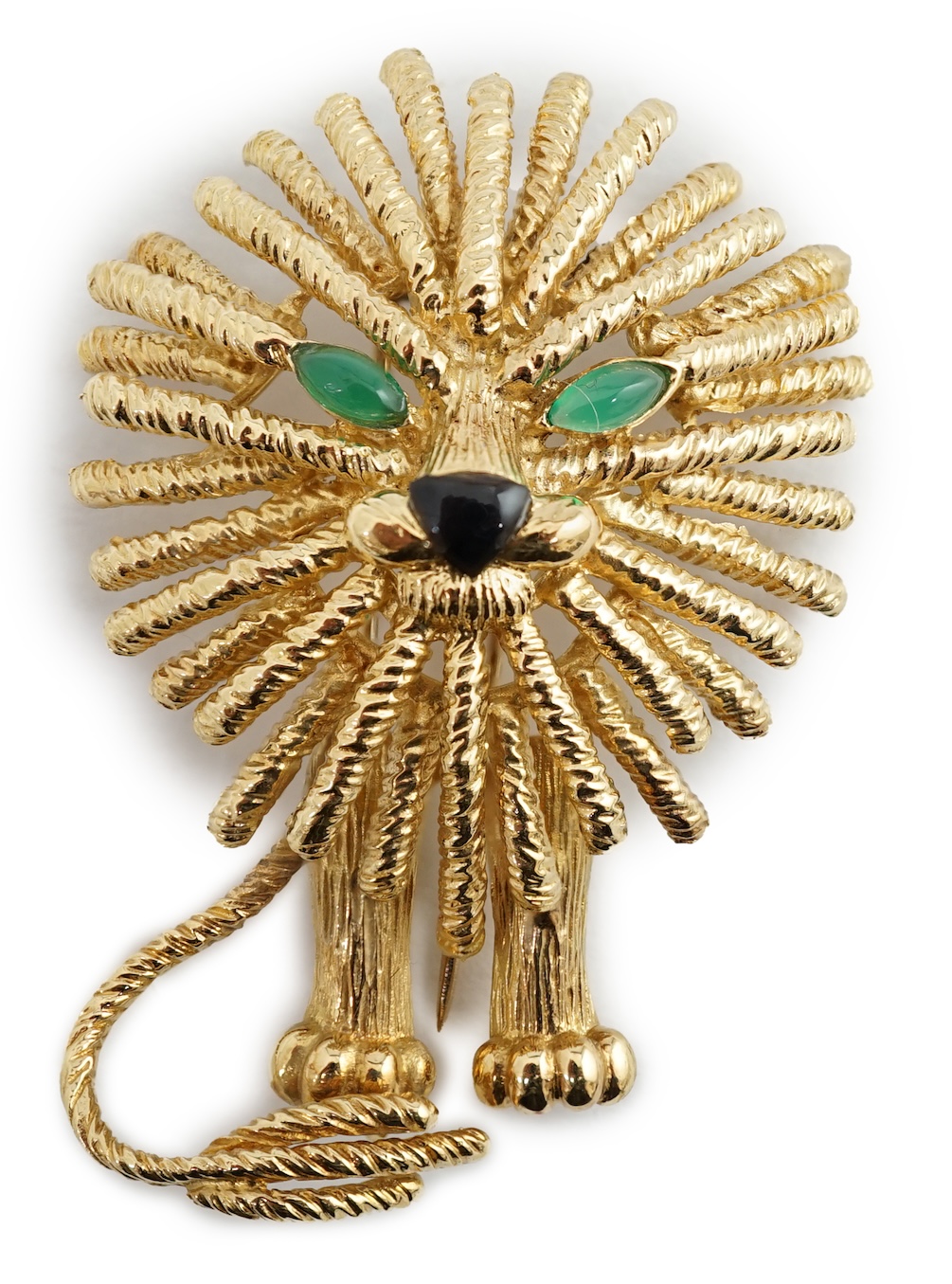 A stylised gold (tests as 18k) 'Lion King' clip brooch set chrysoprase and black enamel